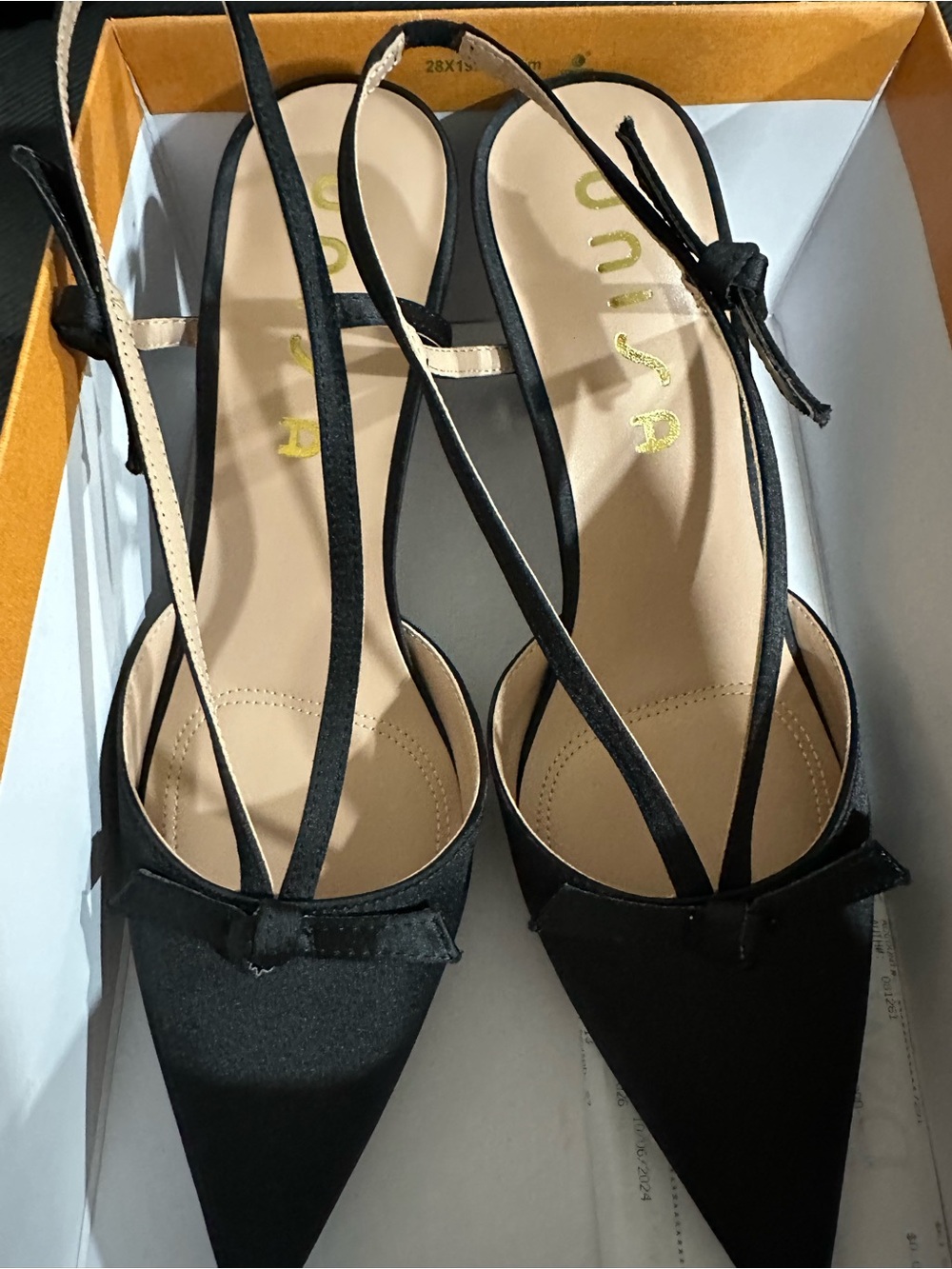 Unisa Black Pointed Slingback Heels with Bow Accent